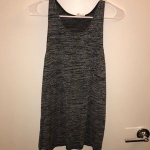 Boxy high low tank with side slits.